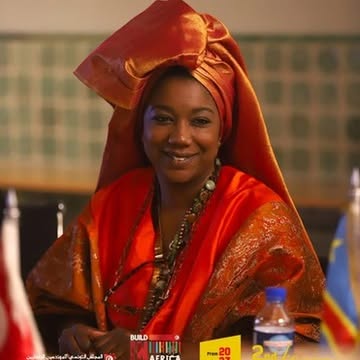 A participant in traditional dress at the Build in Africa programme.